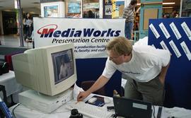 MediaWorks booth at BCIT open house (?) [3 of 5 photographs]