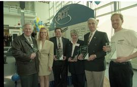 Open House 1998; group of six hold glass rewards given by BCIT [photograph 1 of 2]