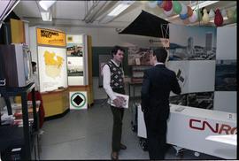 Open House 1986; two men in front of transportation display