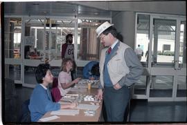 Open House 1986; Man in open house hat in front of registration