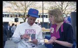 Open House 1992;Man and woman talking while eating cake