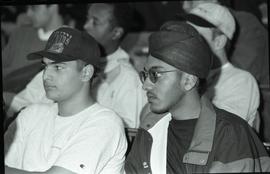 Communications Relations Opening Day 1991; two men listening with other people in background [1 o...