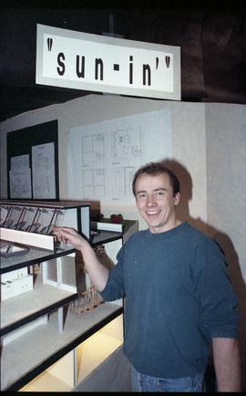 Open House 1992; man pointing at architecture model  [photograph 1 of 3]