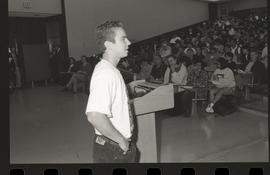 Communications Relations Opening Day 1991; man in t-shirt speaking to students in front of lectur...