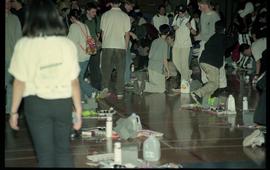 Open House 1998; students leaving projects on ground to leave gym