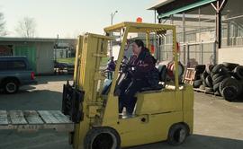 BCIT women in trades; forklift training, students driving a forklift [12 of 15 photographs]