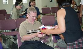 First Nations "Honoring Our Heritage" event, male receiving small token from First Nati...