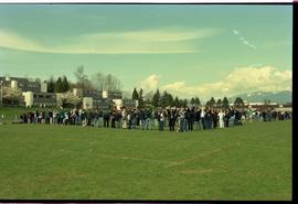 Open House 1998; students and teachers standing on field engaged in group activity [photograph 3 ...