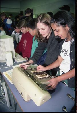 Open House 1998; students examining electronics and computer [photograph 2 of 2]