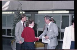Open House 1986; man and woman shaking hands