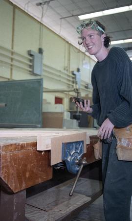 BCIT Women in Trades; carpentry, women using vice [2 of 3 photographs]