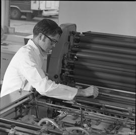 BCVS Graphic arts ; man adjusting settings on a printing press [2 of 2]