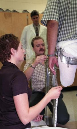 Close-up of precise measurements being taken for prosthetic creation