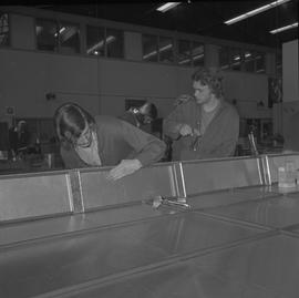 Sheet metal, 1968; students working on sheet metal projects