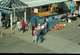 Open House 1998; group in safety vests standing outside of confined rescue station