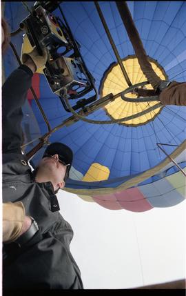 Open house 1992; man pulling lever in hot air balloon [photograph 3 of 3]