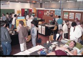 Open House 1986;  various medical displays with volunteer displaying EEG in lab [1 of 3 photographs]