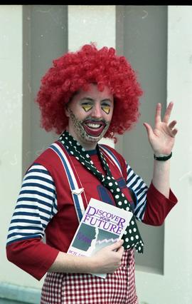 Open house 1992; red wigged clown holding BCIT brochure