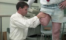 Man examining residual limb [2 of 7 photographs]