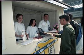 Open House 1998; information kiosk offering orientation  papers  to students [photograph 1 of 2]