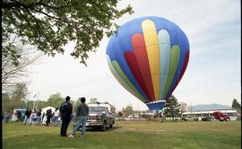 Open house 1992; group viewing hot air balloon on ground