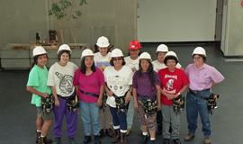 Pre-trade Aboriginal women; students wearing hard hats and tool belts [3 of 8 photographs]