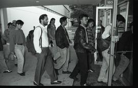 Communications Relations Opening Day 1991; students entering glass doors