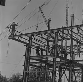 Structural steel, 1971; men working on a steel structure [2 of 3]