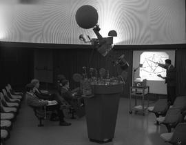 Survey, 1968; photogrammetry and astronomy instructor, Mr. Chiat, lecturing to five students (Bru...