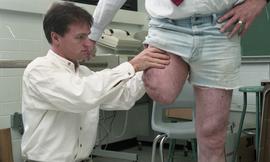 Man examining residual limb [3 of 7 photographs]