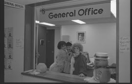 General Office staff dressed as a housewife (?), clown, and priest [7 of 11 photographs]