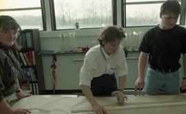 People measuring ink footprints [6 of 10 photographs]