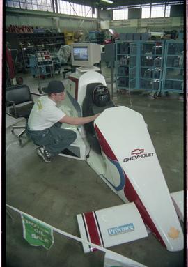 Open House 1998; man assisting child with Chevrolet  VR racing car