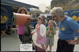 Open house 1992; child using Schmidt–Cassegrain telescope [photograph 1 of 2]