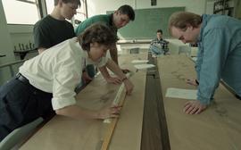 People measuring ink footprints [7 of 10 photographs]