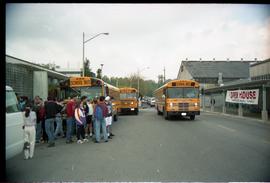 Open house 1992; students watching school bus pull up [photograph 1 of 3]